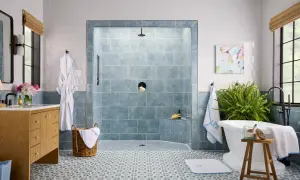 Elegant bathroom featuring a blue marble shower and patterned floor tile combinations.