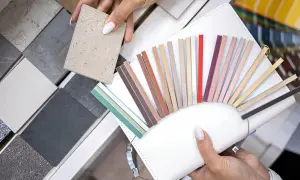 Choosing the best grout for porcelain tile involves selecting the perfect color from a fan of samples.