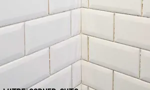 White subway tile corner with mitre cuts, showcasing clean subway tile edge options for a seamless finish.