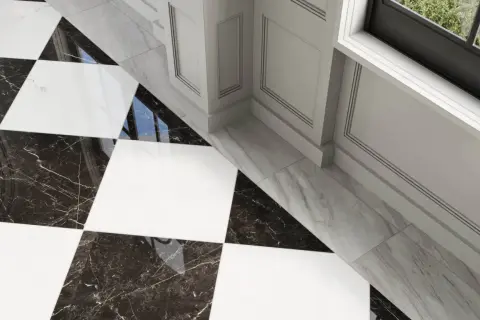 A striking black and white checkerboard tile floor with marble accents. The question of what color grout for black and white checkerboard tile is answered by the subtle, almost invisible grout lines, enhancing the bold pattern.