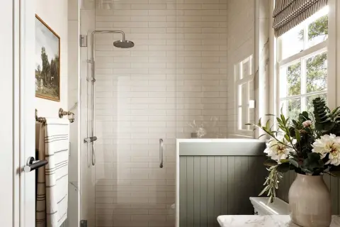 Elegant bathroom with white subway porcelain tile shower ideas, a rainfall showerhead, and a window with natural light.