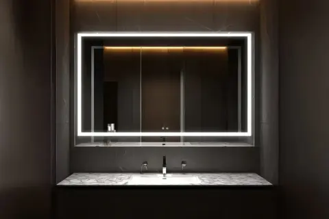 Modern bathroom mirror trends: a sleek, illuminated rectangle above a marble vanity with dual sinks and chrome faucets.
