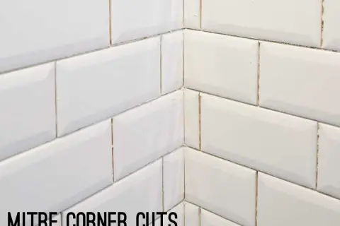 White subway tile corner with mitre cuts, showcasing clean subway tile edge options for a seamless finish.