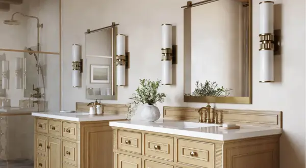 Elegant bathroom with double vanity, brass fixtures, and modern vanity light height 8 ft ceiling.