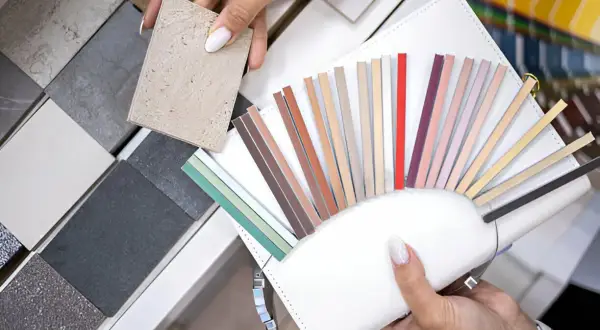 Choosing the best grout for porcelain tile involves selecting the perfect color from a fan of samples.
