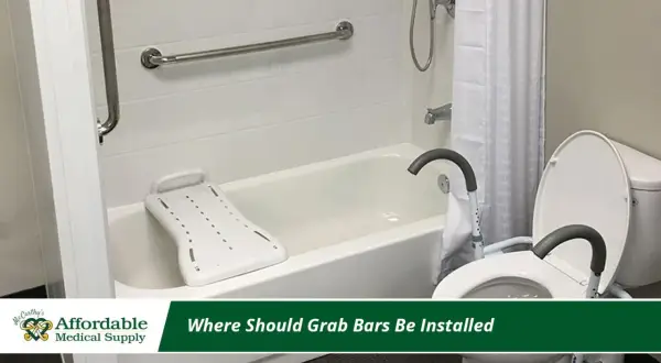 Bathroom with grab bar installation for safety. A bathtub with a transfer bench and a toilet with a raised seat are visible.