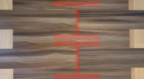 Visual guide on how to install vinyl plank flooring, showing a pattern of wood-look planks with a red overlay indicating installation steps.