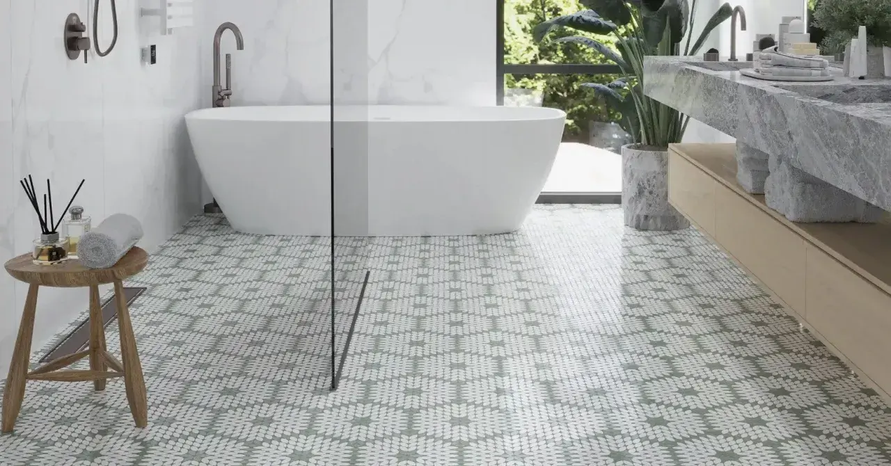 Stylish bathroom with a freestanding tub and a patterned floor. Pictures of shower floors like this one showcase a modern design.