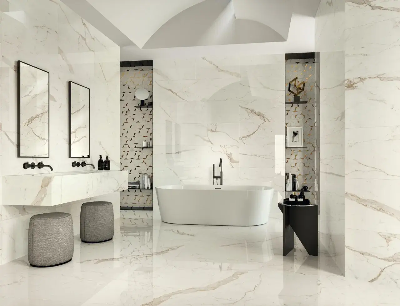 Luxurious bathroom with marble-look tiles featuring thin grout lines vs thick. A freestanding tub, double vanity, and modern stools create a spa-like atmosphere.