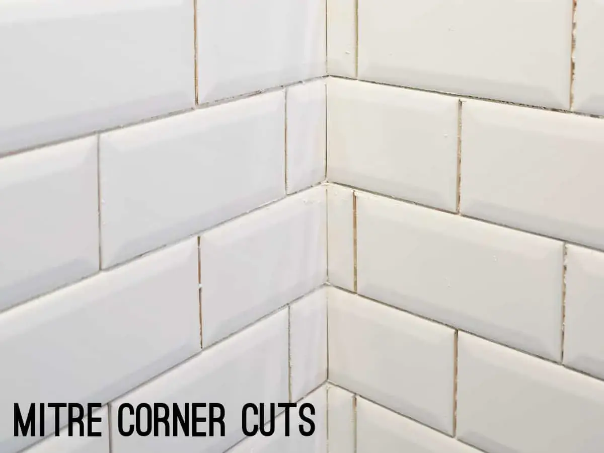 White subway tile corner with mitre cuts, showcasing clean subway tile edge options for a seamless finish.