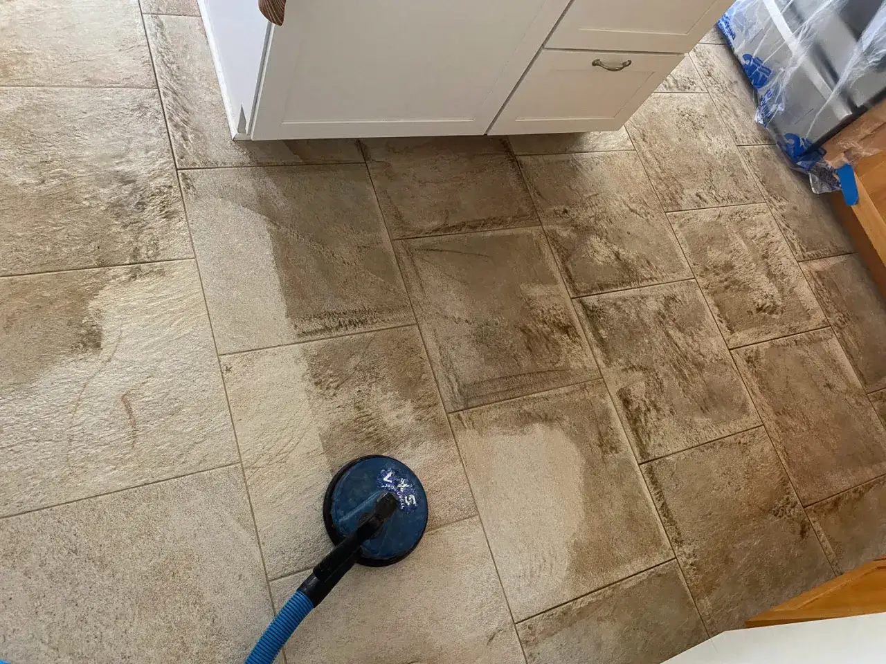 A floor buffer is used to restore the shine on porcelain tile. This process shows how to make porcelain tile shine again.