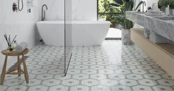 Stylish bathroom with a freestanding tub and a patterned floor. Pictures of shower floors like this one showcase a modern design.