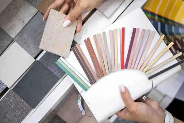 Choosing the best grout for porcelain tile involves selecting the perfect color from a fan of samples.