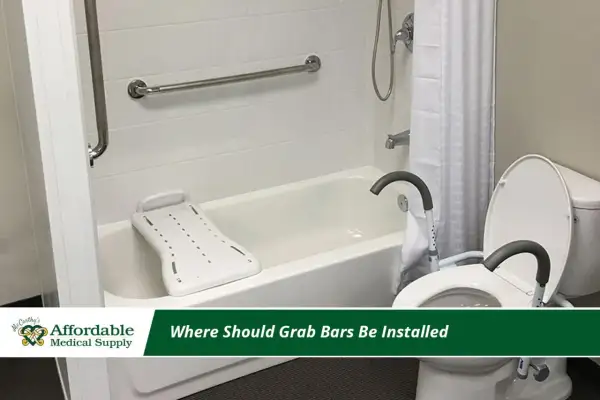 Bathroom with grab bar installation for safety. A bathtub with a transfer bench and a toilet with a raised seat are visible.