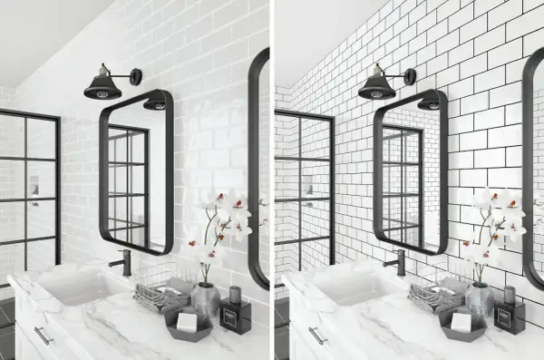 A modern bathroom features white subway tile with dark grout, a black framed mirror, and a black industrial-style light fixture.